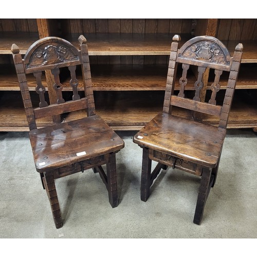 130 - A pair of 17th Century style carved hardwood side chairs