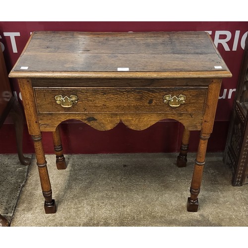 111 - 17th Century style oak single drawer side table