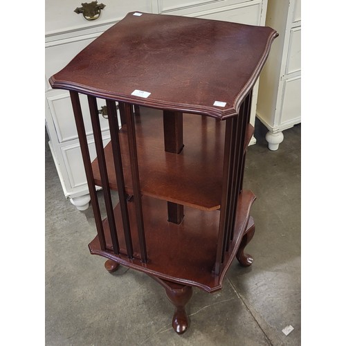 168 - A mahogany revolving bookcase