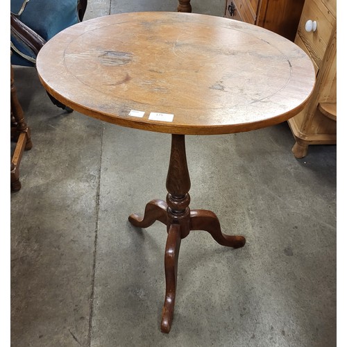 175 - An Edward VII walnut oval tripod occasional table