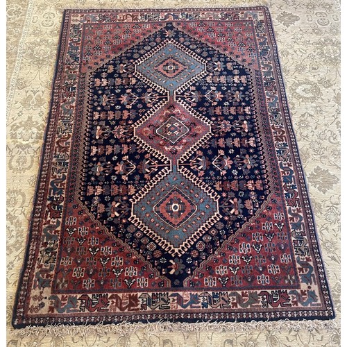 219 - Three assorted rugs