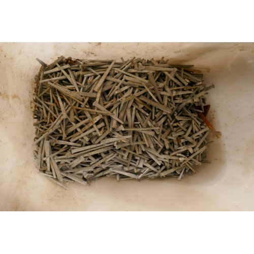 2371 - A bucket of galvanised floor nails