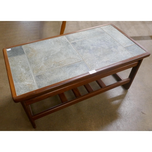 11 - A Scandinavian teak and tiled top coffee table