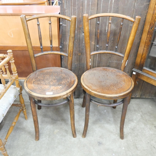 116 - A pair of early 20th Century beech bentwood chairs