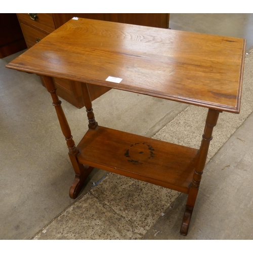 129 - An Arts and Crafts oak occasional table