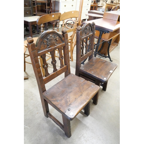 130 - A pair of 17th Century style carved hardwood side chairs