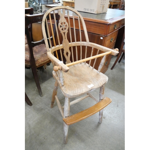 135 - A 19th Century style elm and beech child's Windsor chair