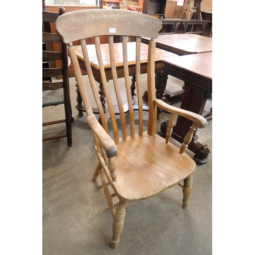 148 - A Victorian elm and beech farmhouse kitchen chair