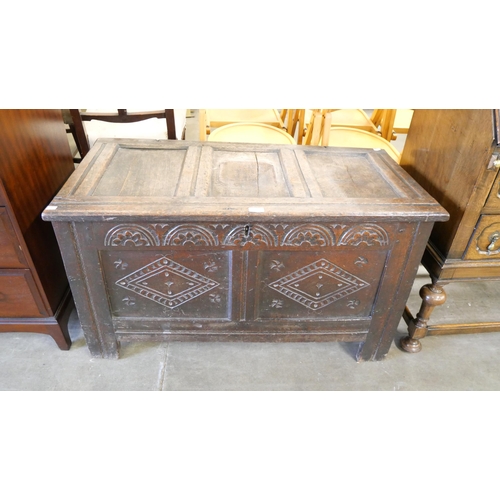 165 - A William III carved oak coffer