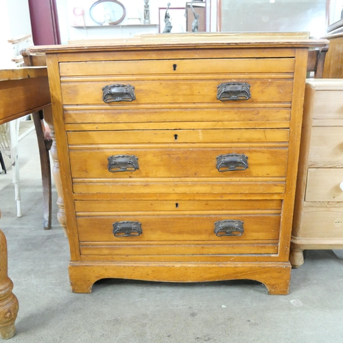 172 - A late Victorian satin birch chest of drawers