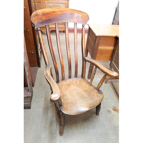 180 - A Victorian elm and beech farmhouse kitchen chair