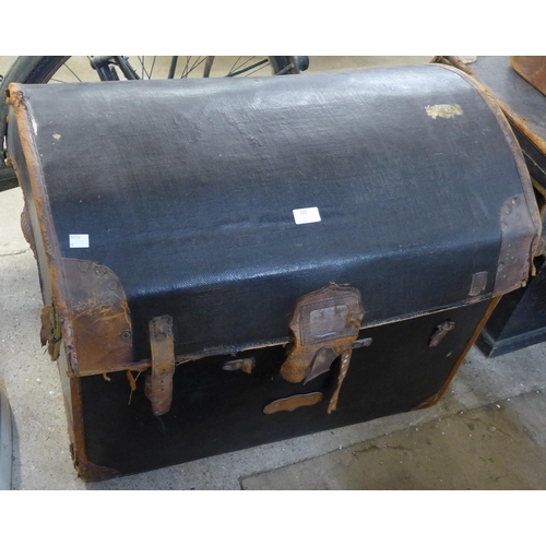 205 - An early 20th Century black leather steamer trunk