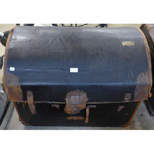 205 - An early 20th Century black leather steamer trunk