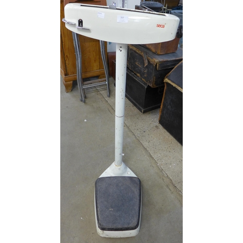 207 - A set of Seca white metal weighing scales