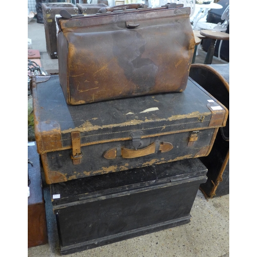 208 - Two vintage steamer trunks and a suitcase