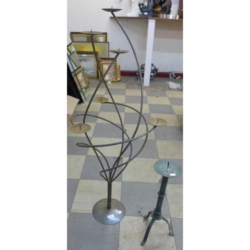 214 - Two metal candle stands