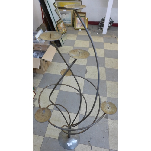 214 - Two metal candle stands