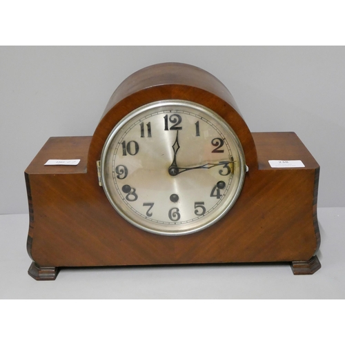 238 - An early 20th Century walnut mantel clock