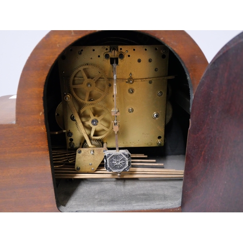 238 - An early 20th Century walnut mantel clock