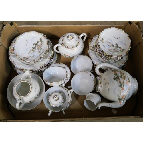 257 - A Japanese eggshell tea and dinner service