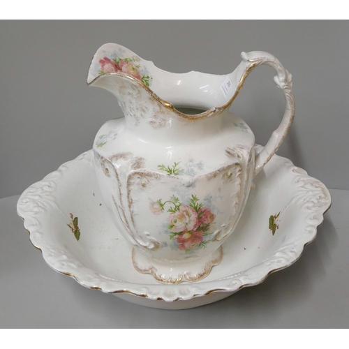 260 - A Staffordshire porcelain wash jug and bowl