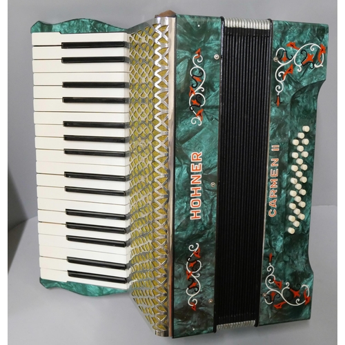 265 - A cased Hohner piano accordian