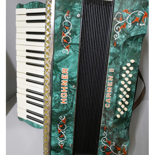 265 - A cased Hohner piano accordian