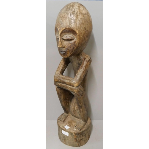 270 - A carved wood tribal figure