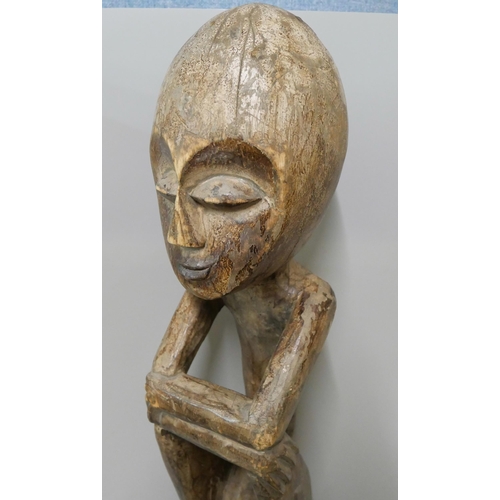 270 - A carved wood tribal figure