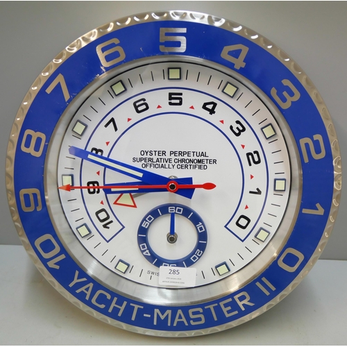 285 - A Rolex style dealer's display wall clock