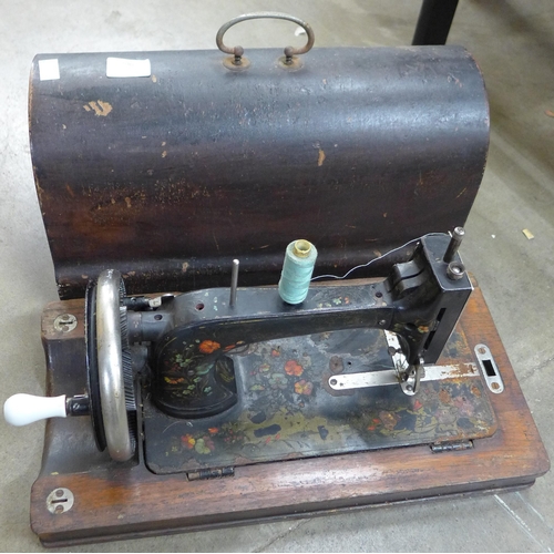 296 - A cased J.D. Williams sewing machine