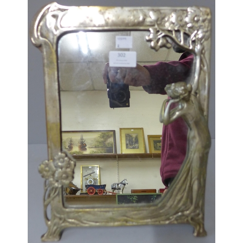 302 - An Art Nouveau style white metal strut mirror