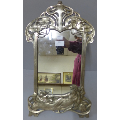 303 - An Art Nouveau style white metal strut mirror