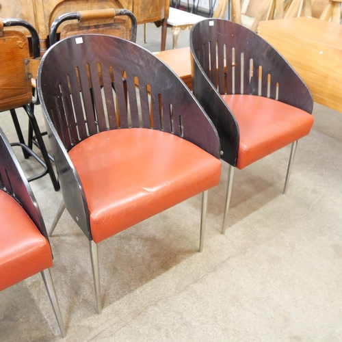 44B - A set of three Phillipe Starck style bent plywood and red vinyl chairs