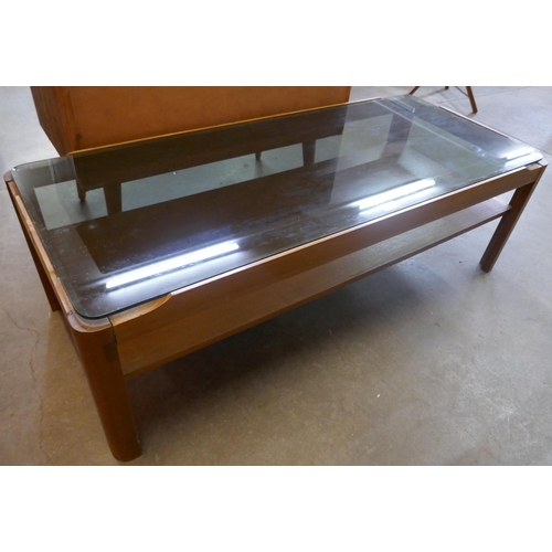 48 - A Myer teak and glass topped rectangular coffee table