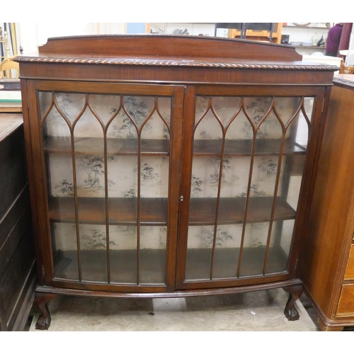 56 - An early 20th Century mahogany two door bow front display cabinet