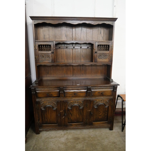 69 - A 17th Century style Jaycee carved oak dresser