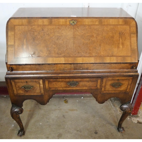 71 - A Queen Anne style walnut bureau de dame