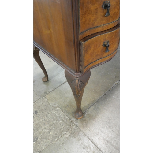 81 - A Queen Anne style burr walnut desk