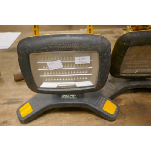 2406A - Two Mukrphy Night Searcher 12v work lights and a pick axe