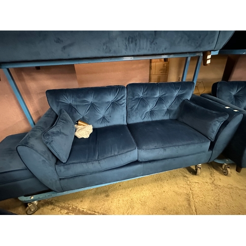 1558 - A Hoxton blue velvet upholstered three seater sofa and footstool, RRP £799