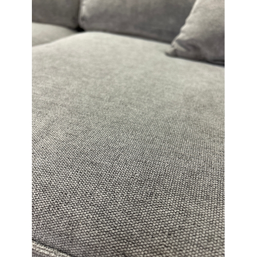 1549 - A Barker and Stonehouse Rene Grey upholstered three seater sofa, some minor damage and marks, RRP £1... 