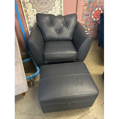 1551 - A Hoxton dark blue leather armchair and footstool