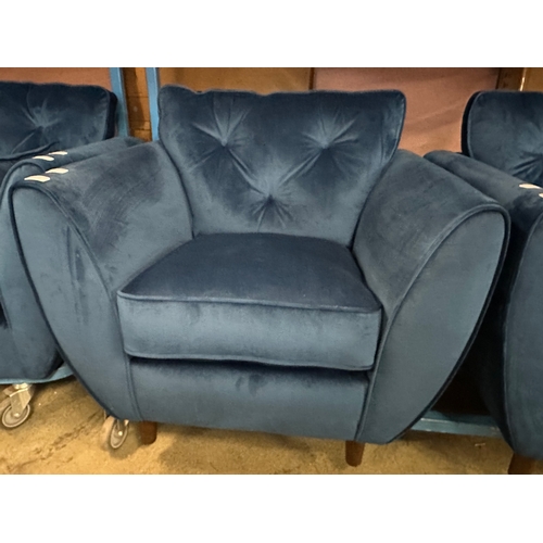 1561 - A Hoxton blue velvet upholstered armchair, RRP £759