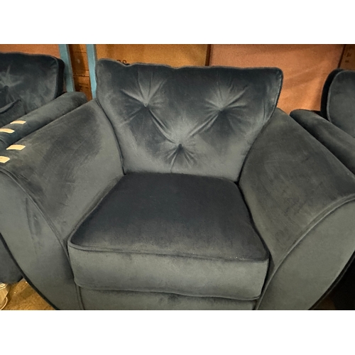 1561 - A Hoxton blue velvet upholstered armchair, RRP £759