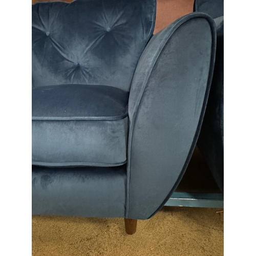 1561 - A Hoxton blue velvet upholstered armchair, RRP £759