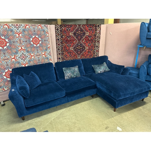 1554 - A large dark blue velvet upholstered RHF corner sofa/chaise RRP £2,626