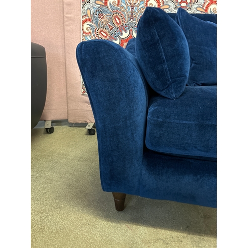 1554 - A large dark blue velvet upholstered RHF corner sofa/chaise RRP £2,626