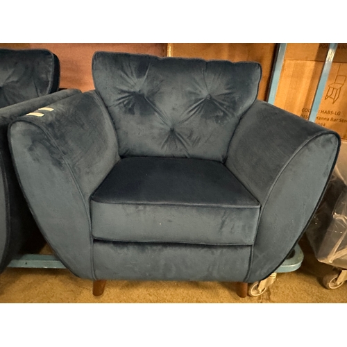 1562 - A Hoxton blue velvet upholstered armchair, RRP £759