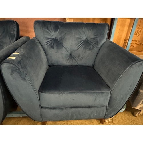 1562 - A Hoxton blue velvet upholstered armchair, RRP £759